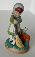 Porcelain Girl with broom