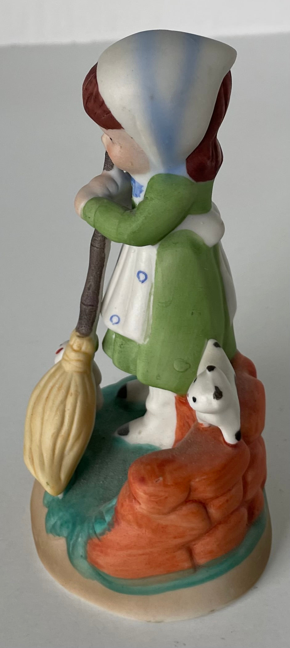 Porcelain Girl with broom