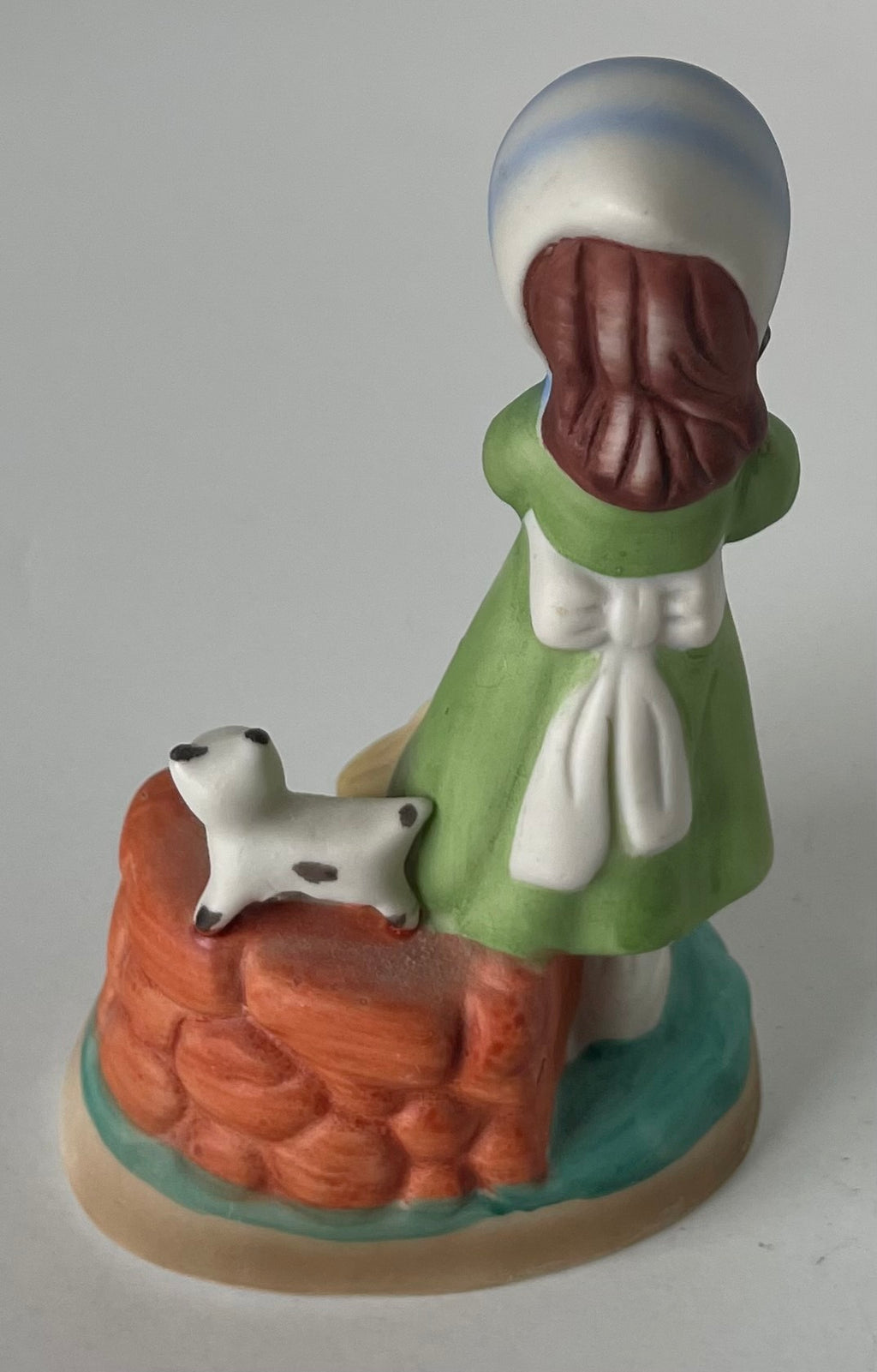 Porcelain Girl with broom
