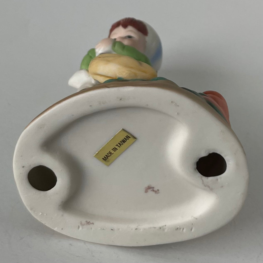 Porcelain Girl with broom