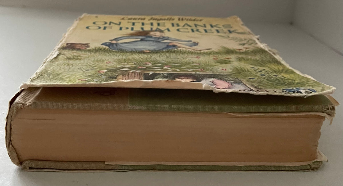 Laura Ingalls Wilder 1953 " On the Banks of Plum Creek" Hardback Book